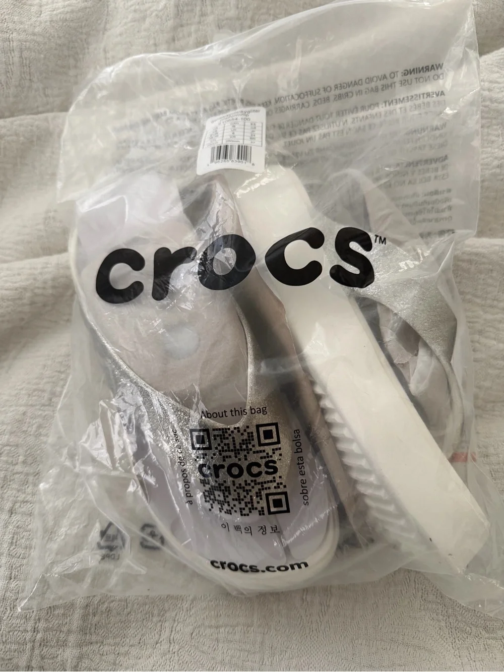 CROCS Metallic Silver Slide Sandals with White Sole